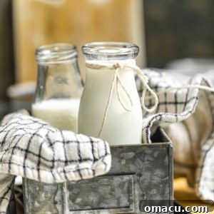 A charming image of homemade buttermilk in a tin box, inviting bakers to try this simple recipe.