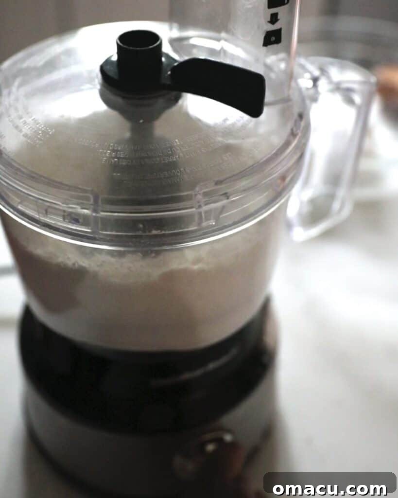 almond flour and powdered sugar in a food processor