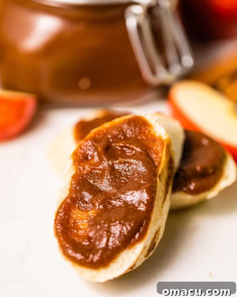 apple butter spread on a piece of bread