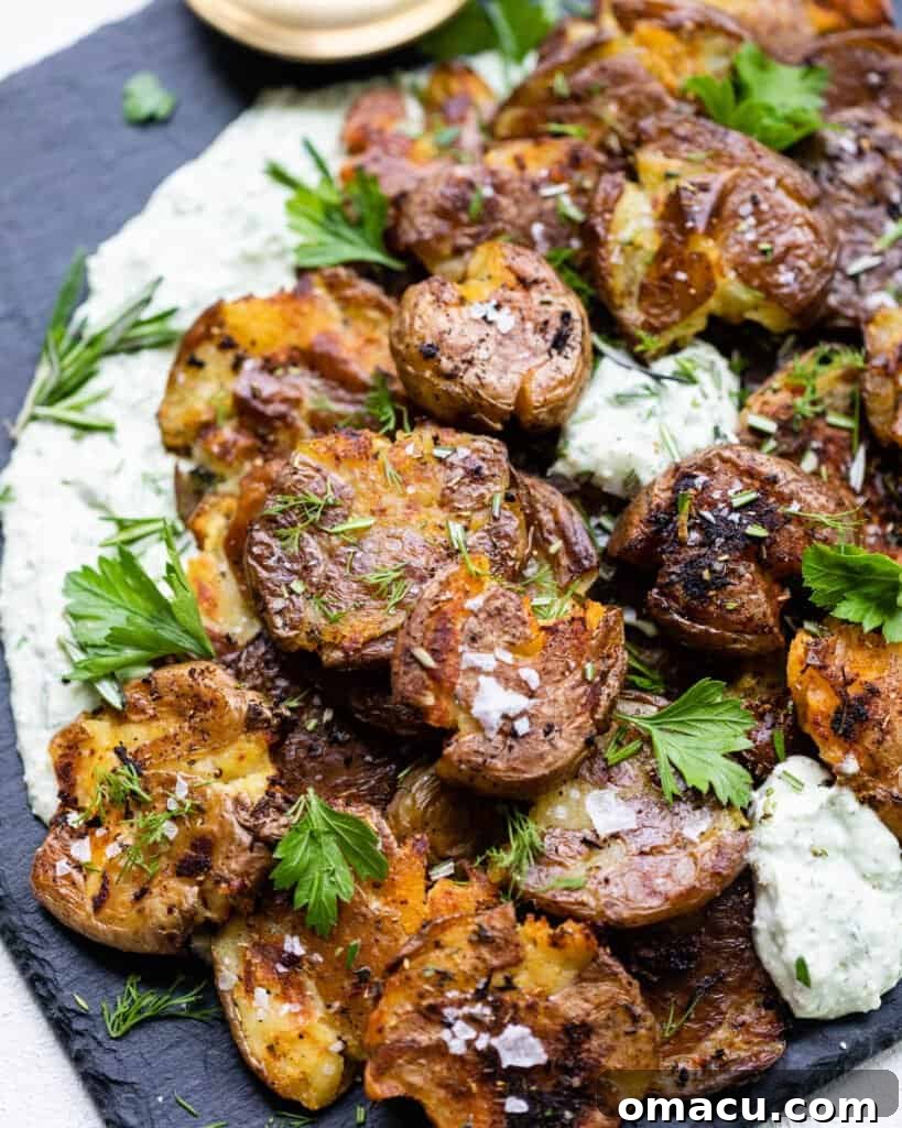 smashed potatoes on a serving board