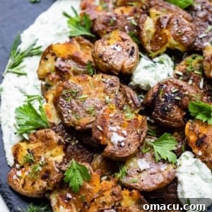 smashed potatoes on a serving board