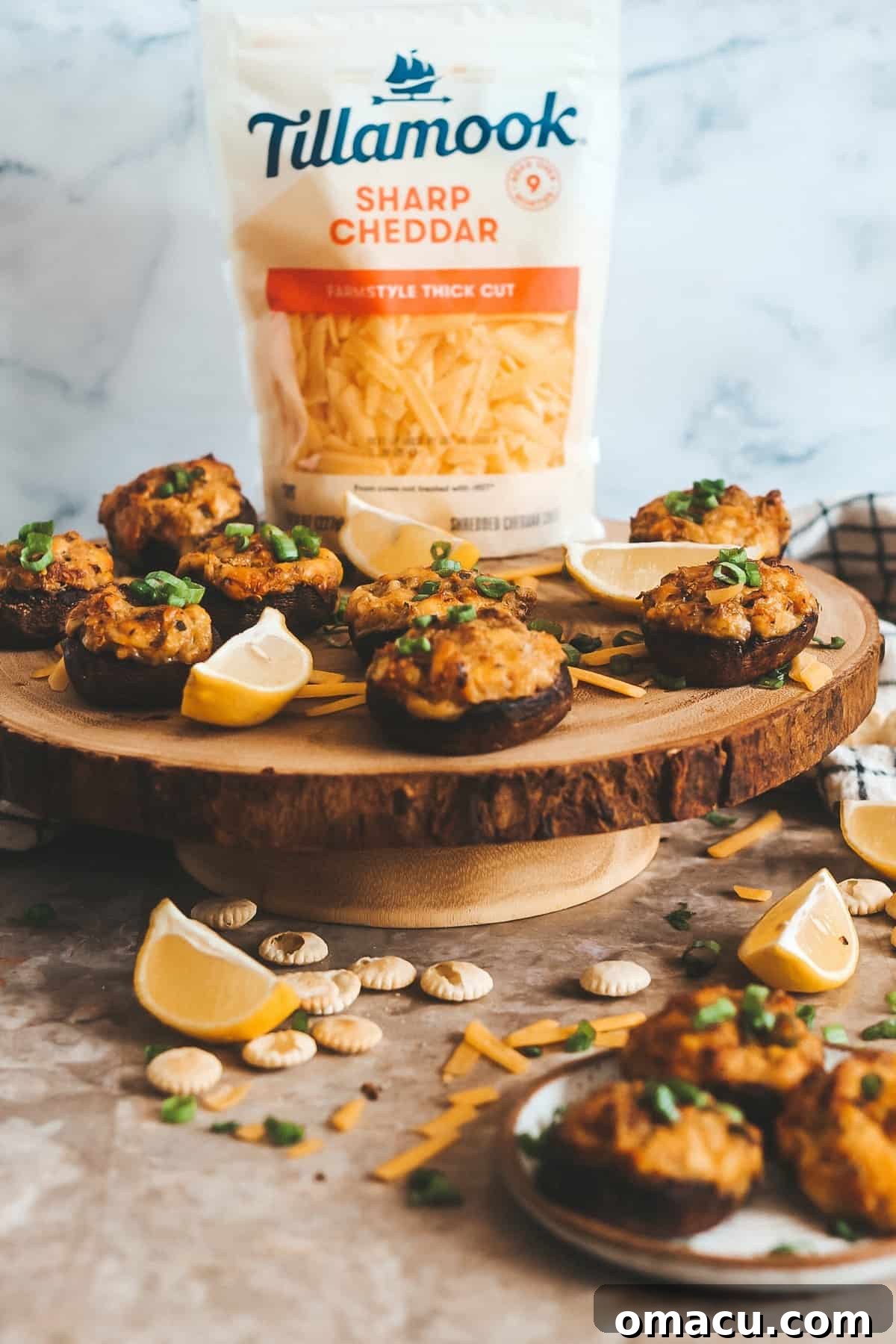 Close-up of baked Cheesy Old Bay Crab Stuffed Mushrooms, highlighting the perfectly melted cheese and rich filling