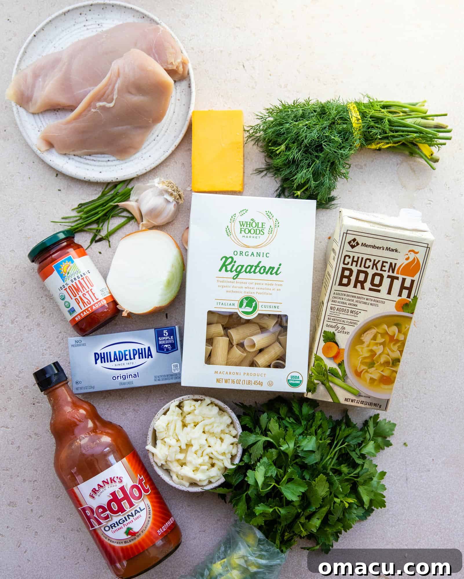 All ingredients neatly arranged on a cutting board, ready to make buffalo chicken pasta