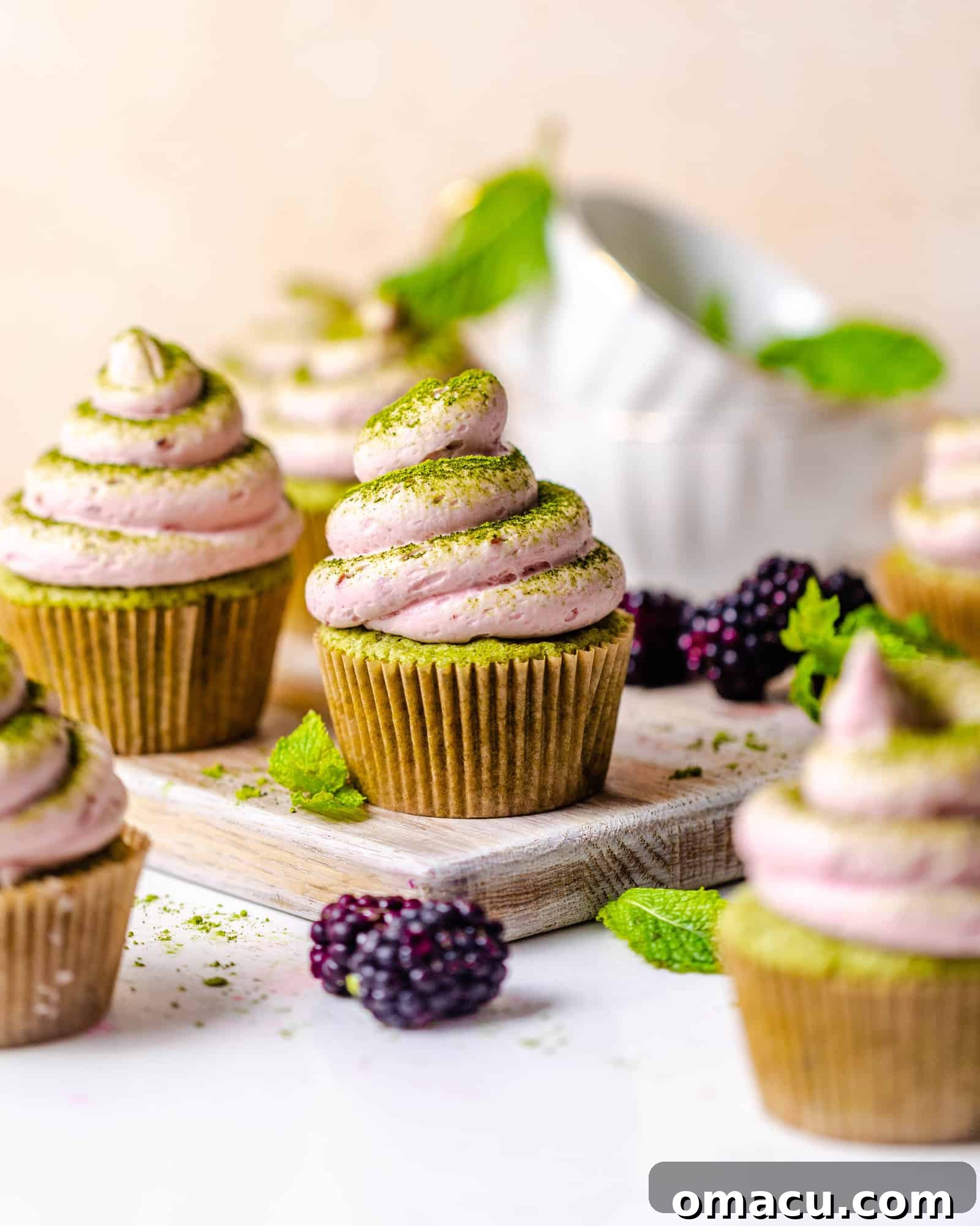 matcha cupcakes on a serving board