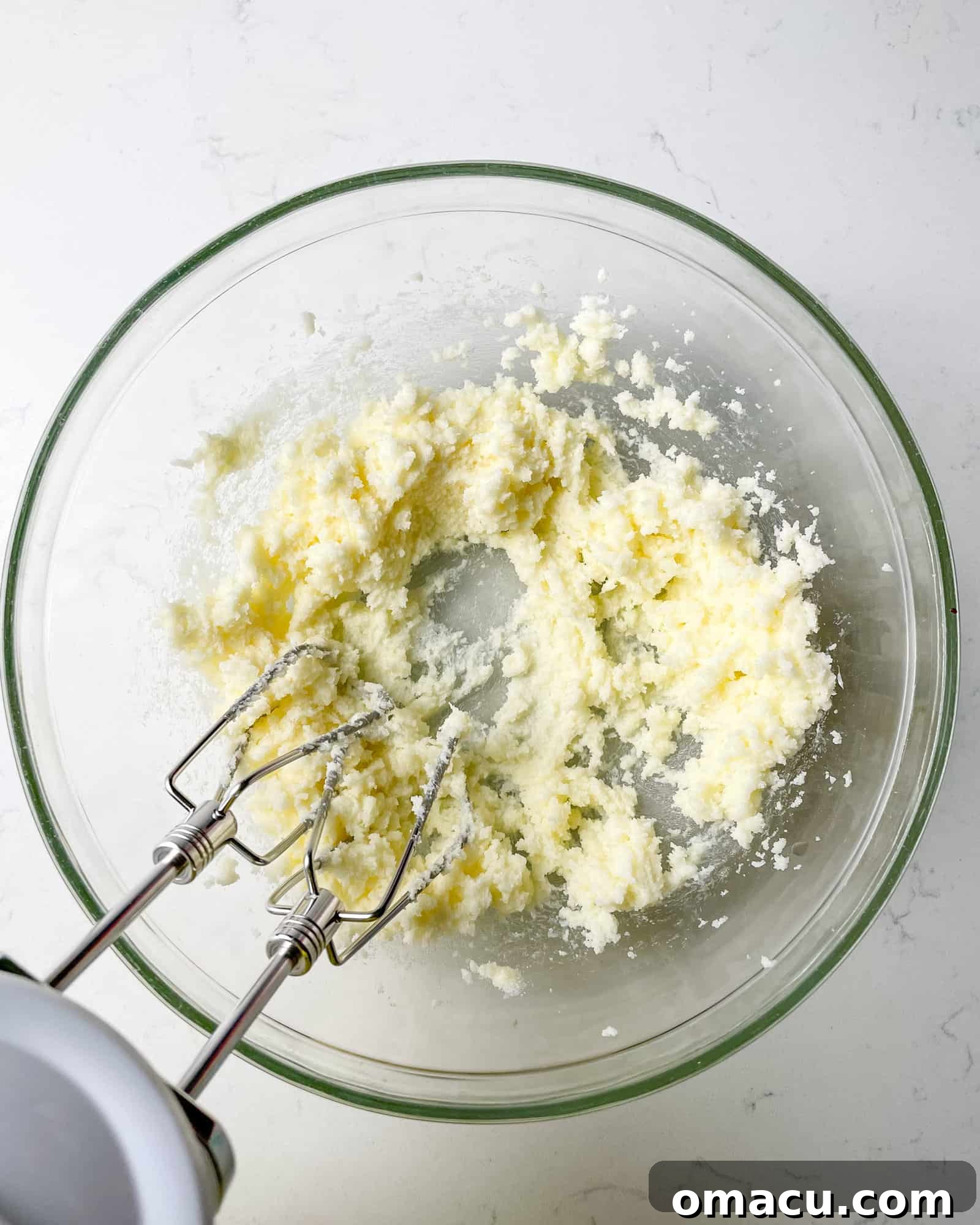 butter and sugar in a mixing bowl