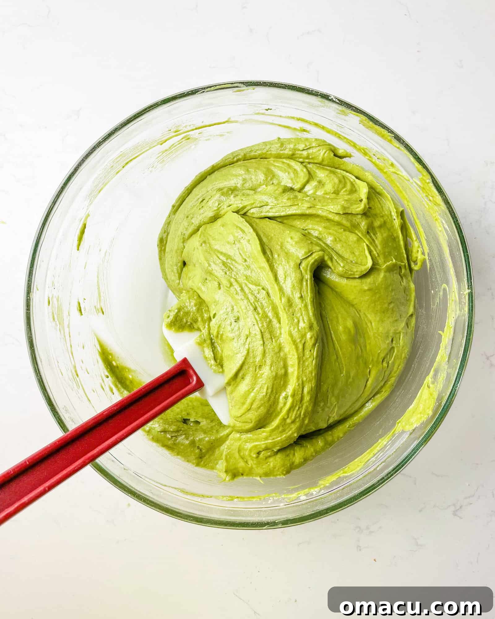 matcha cupcake batter in a bowl