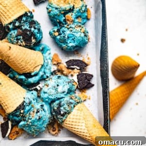 cookie monster ice cream in ice cream cones in a loaf pan.