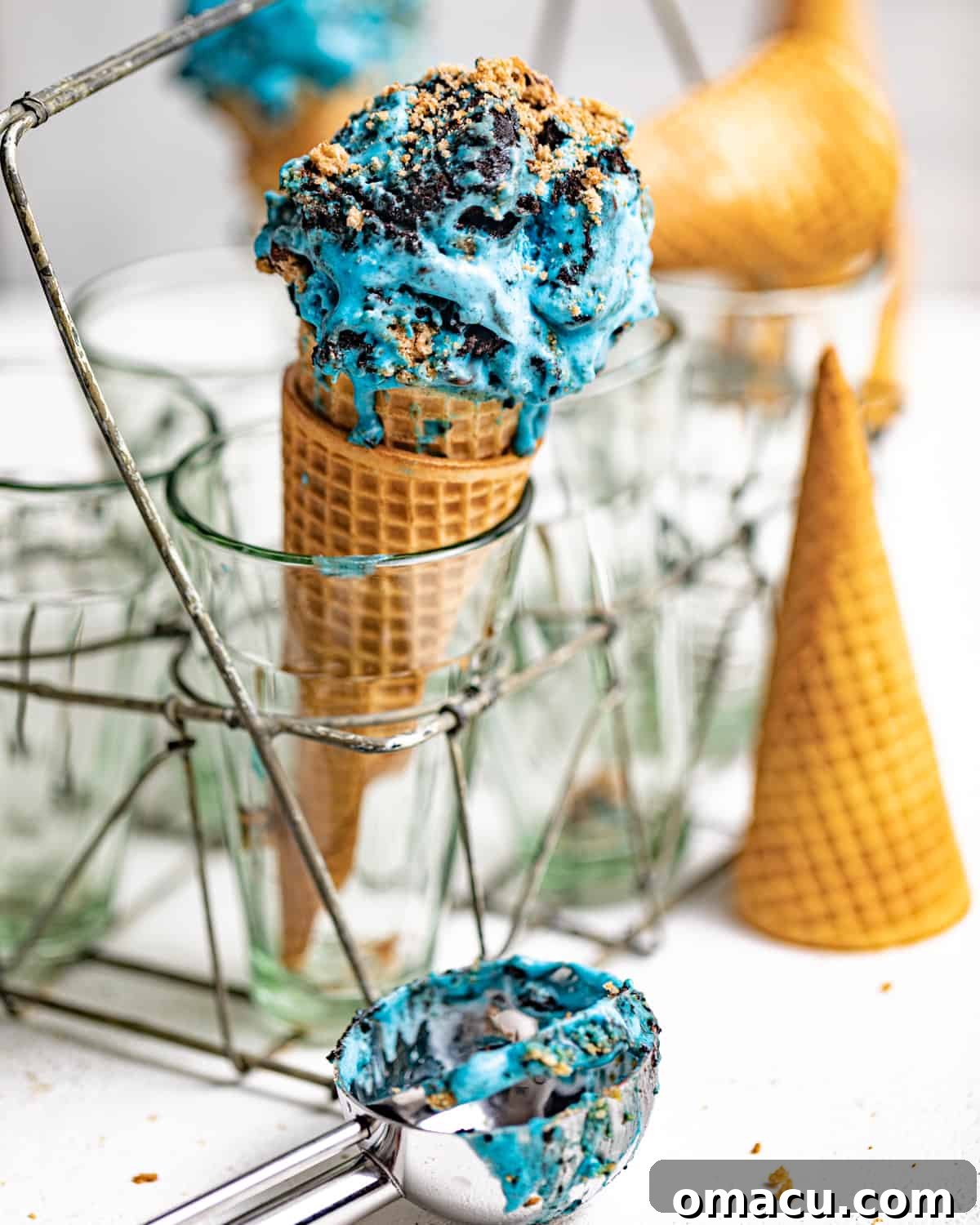 an ice cream cone inside of a glass.
