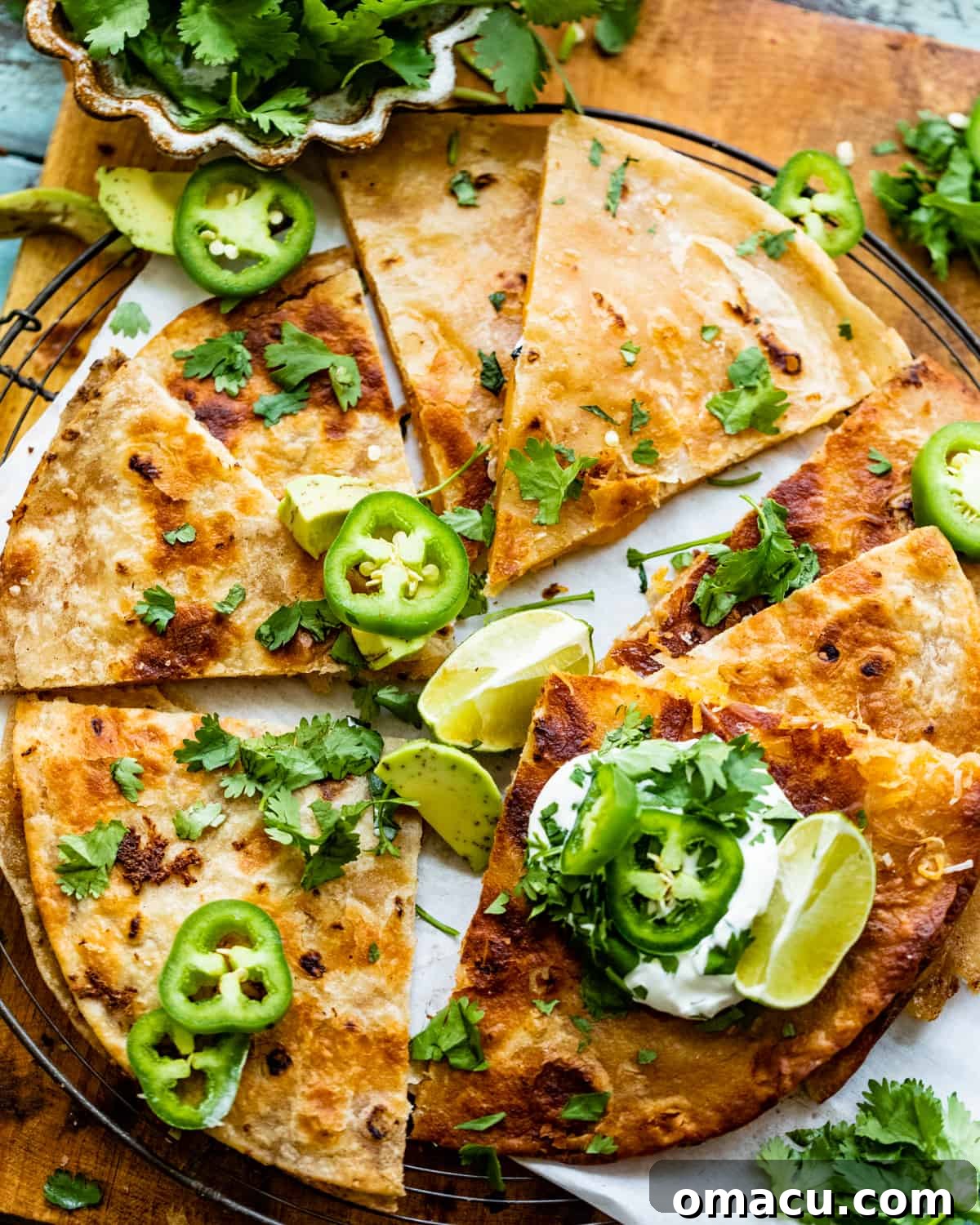 sliced quesadilla on a cooling rack.