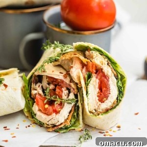 chicken bacon ranch wrap on a piece of parchment paper.