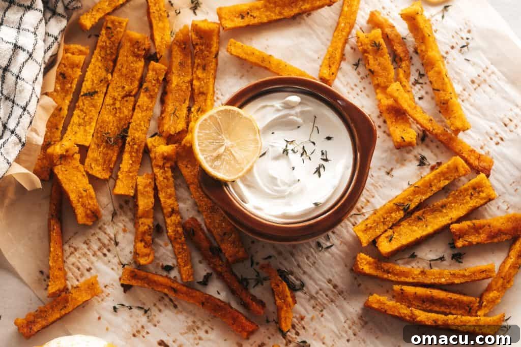 Herby Pumpkin Polenta Fries ready to be served on a table