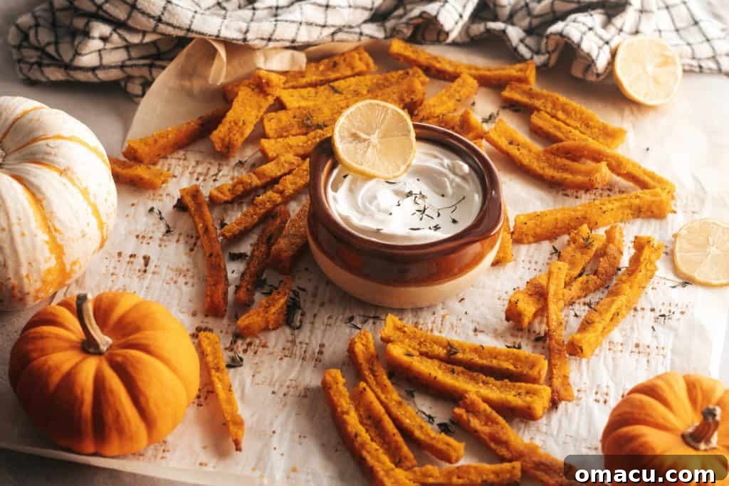 Close-up of golden brown Herby Pumpkin Polenta Fries