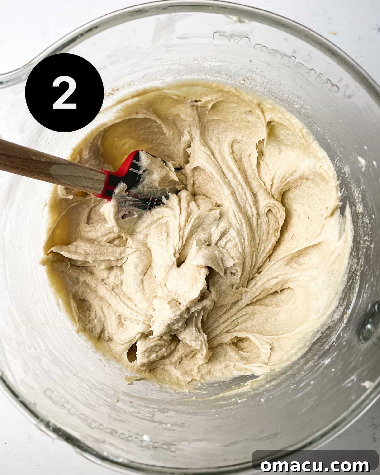 cream cheese and butter mixed together in a bowl.