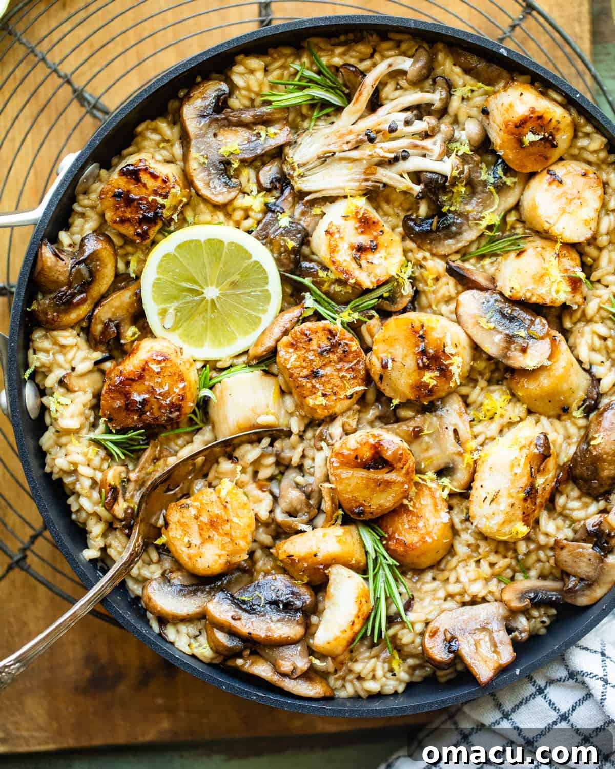 Mushroom Risotto with Scallops in a pan, ready to be served.