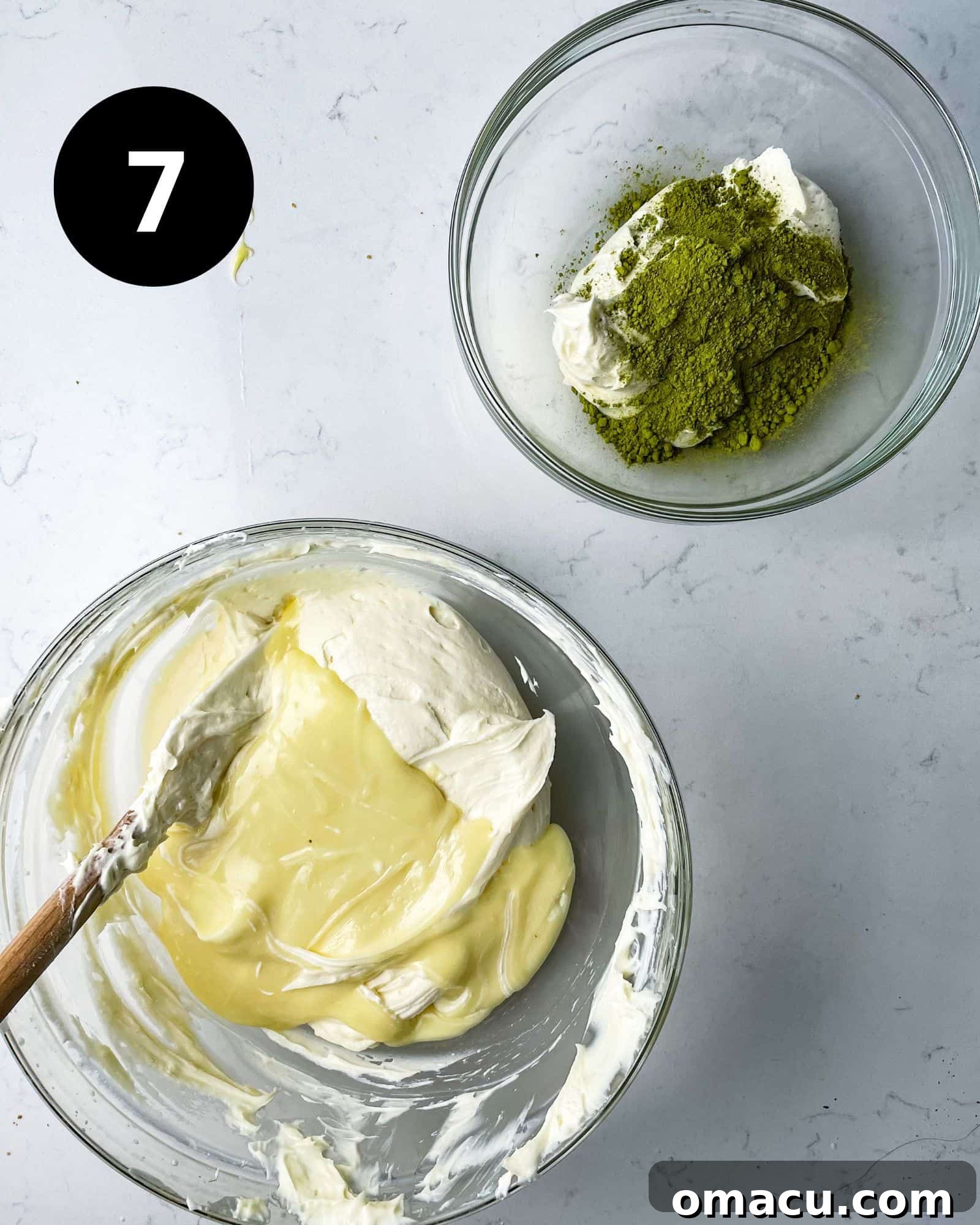 Cheesecake batter divided into two bowls, one for white chocolate, one for matcha.
