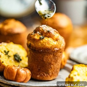A perfectly baked pumpkin popover on a plate, ready to be enjoyed.
