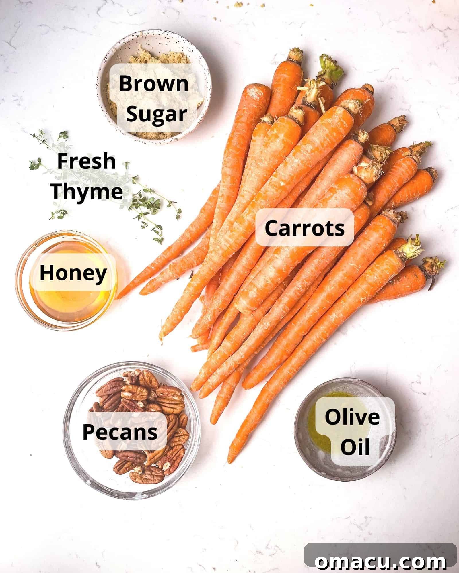 A flat lay photograph showcasing all the fresh ingredients needed for brown sugar honey glazed carrots: whole carrots, brown sugar, honey, olive oil, chopped pecans, and fresh thyme sprigs.