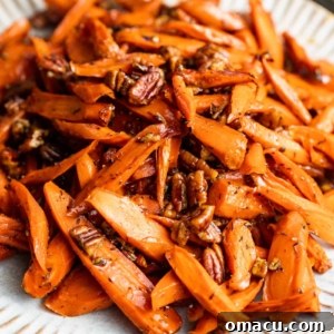 brown sugar honey glazed carrots on a plate.