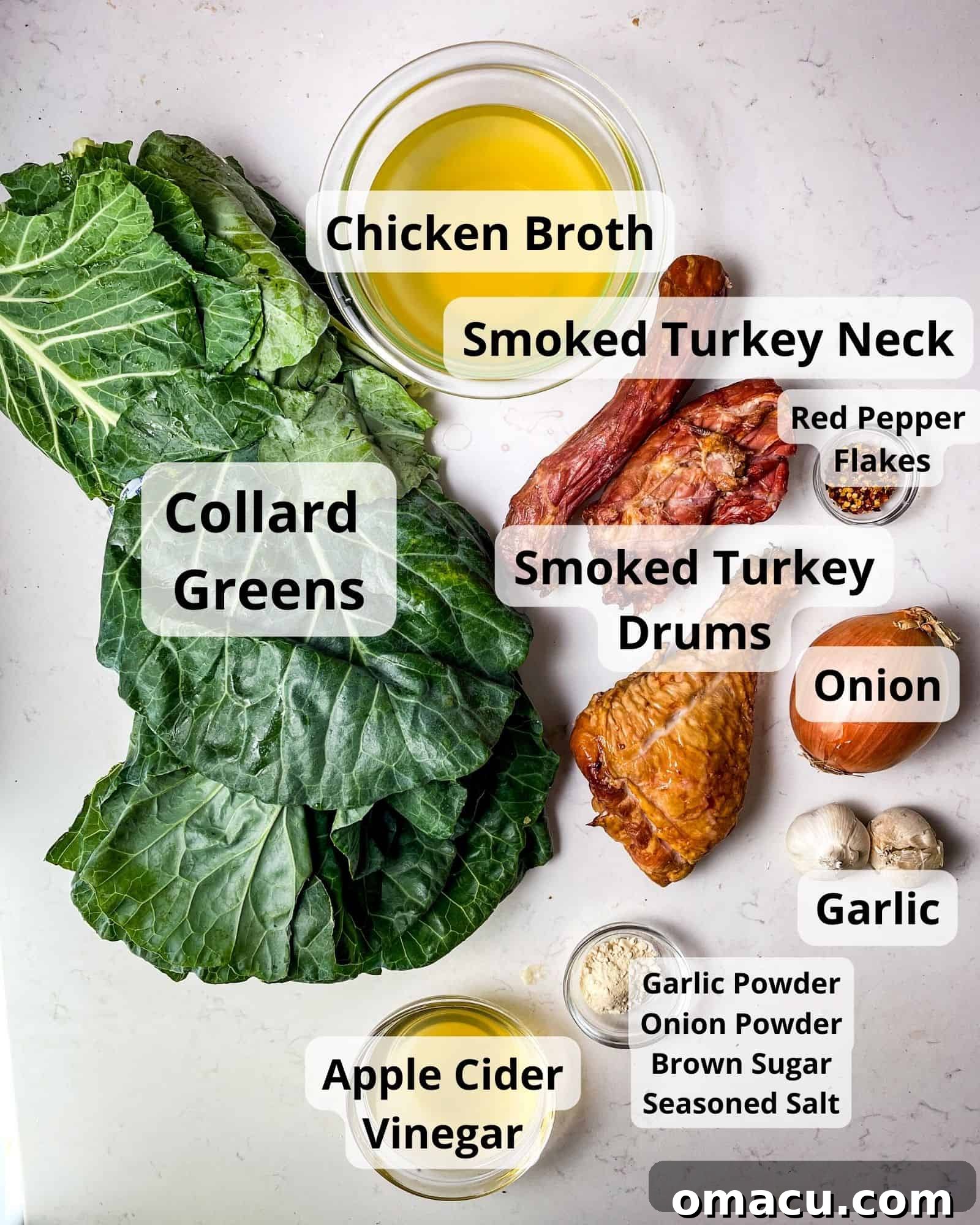 Ingredients for slow cooker collard greens: fresh collard greens, chicken broth, smoked turkey neck, smoked turkey drums, onion, garlic, red pepper flakes, apple cider vinegar, garlic powder, brown sugar, seasoned salt, and onion powder.