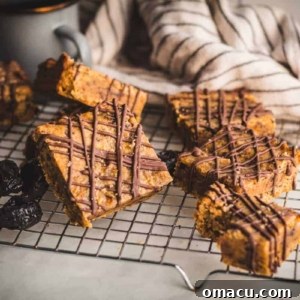 Miso Prune Blondies with Chocolate Drizzle, a delectable and unique dessert.