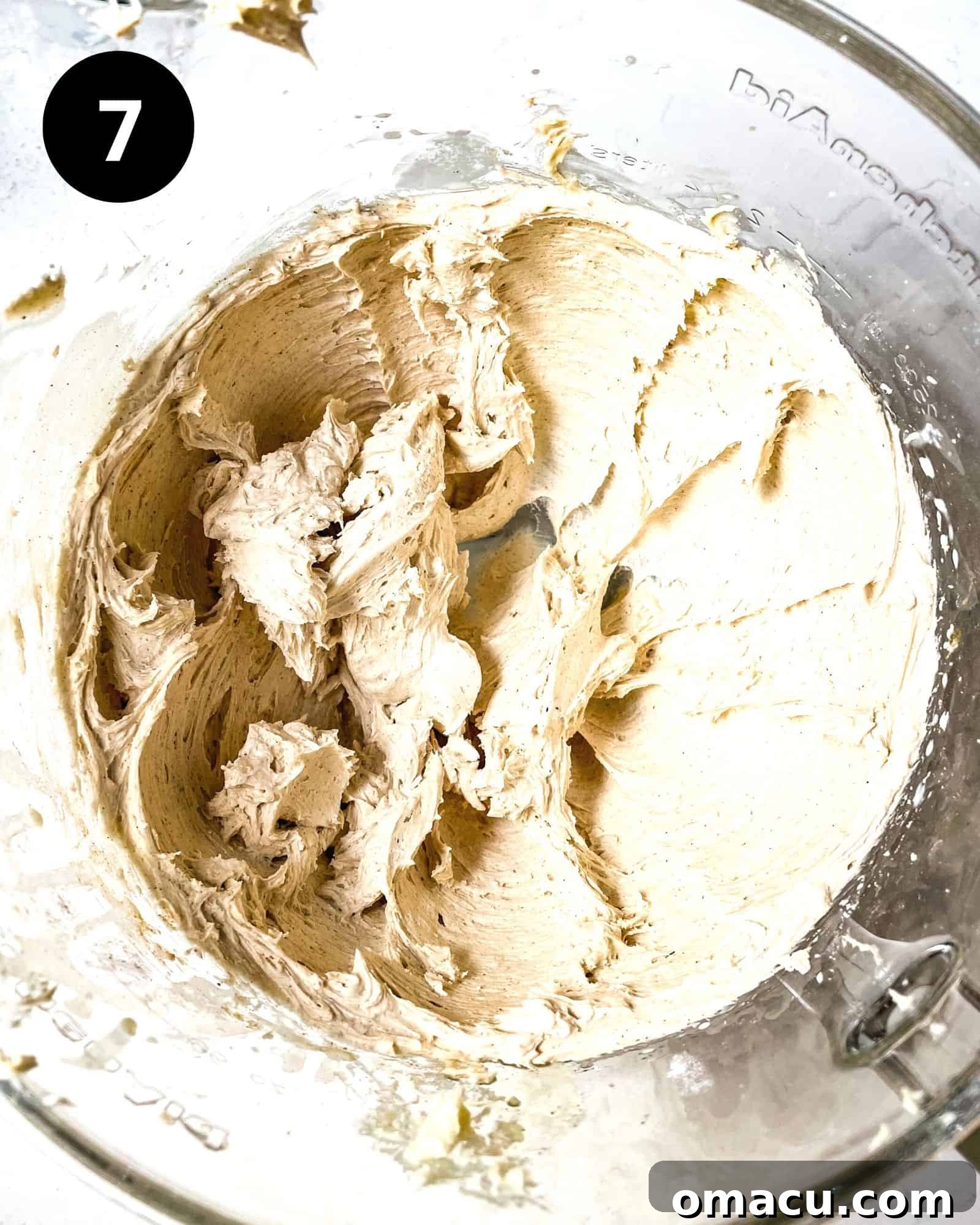 smooth and creamy gingerbread buttercream in a mixing bowl, ready for filling.