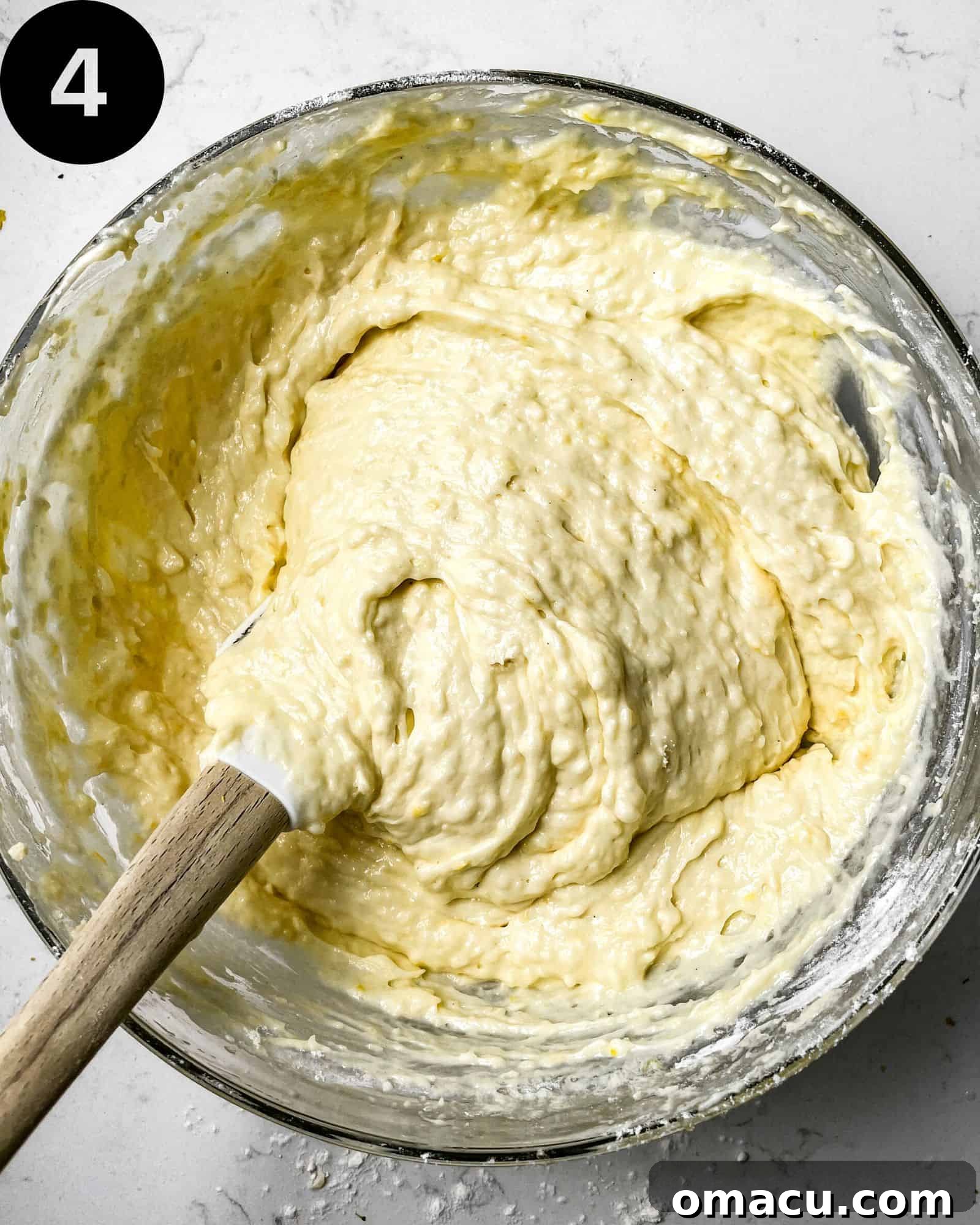 lemon loaf batter in a mixing bowl, smooth and ready for the pan.
