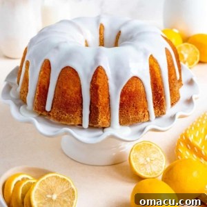 A vibrant lemon bundt cake with a luscious glaze on top, promising a zesty and moist dessert experience.