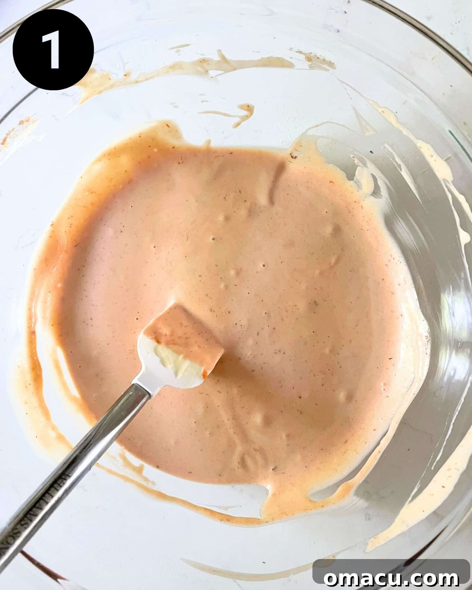 A close-up shot of the Boom Boom sauce in a bowl, freshly mixed and ready for use.