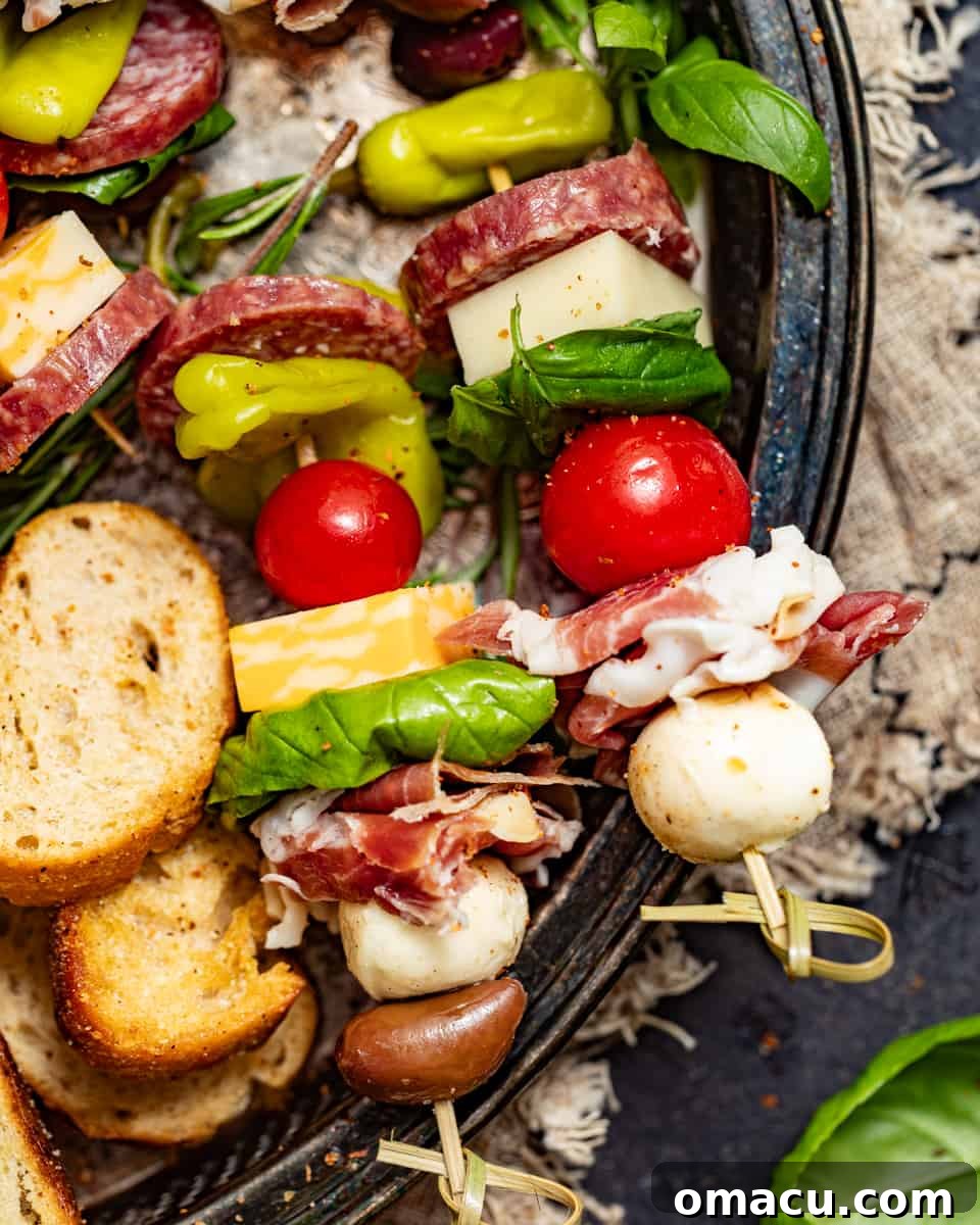 A close-up view of a beautifully assembled charcuterie skewer, showcasing the variety of ingredients and vibrant colors.