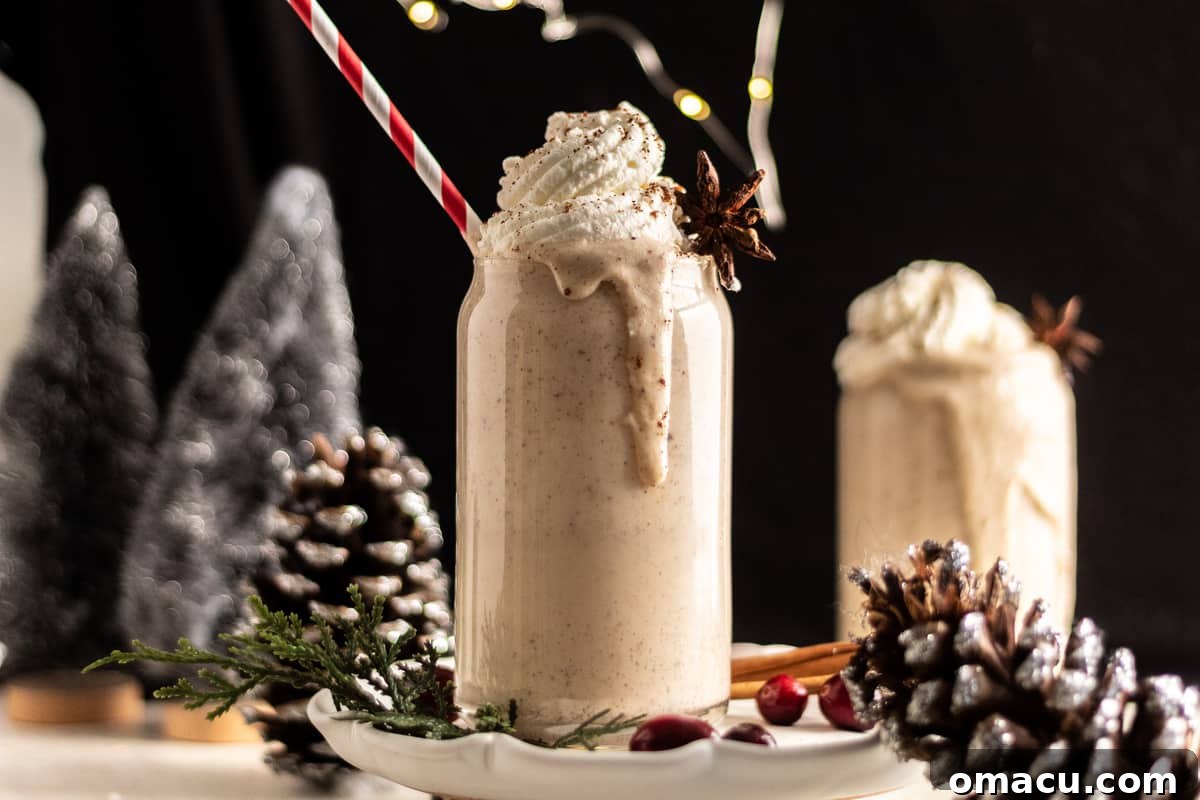 Two glasses of Bourbon Eggnog with spices