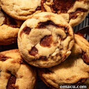 cinnamon cookies on a serving tray with cinnamon sticks