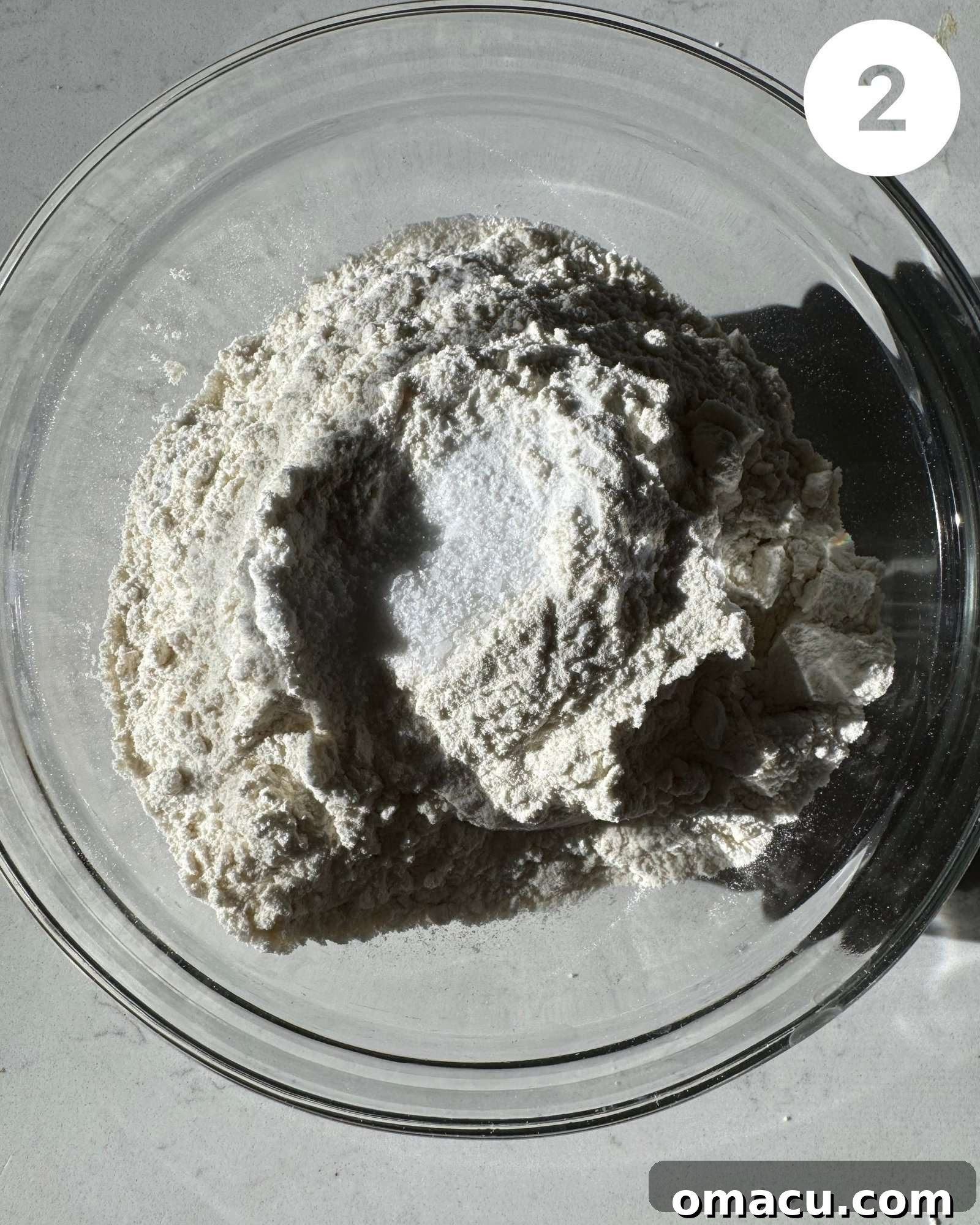 All-purpose flour, baking soda, and salt perfectly mixed together in a large bowl