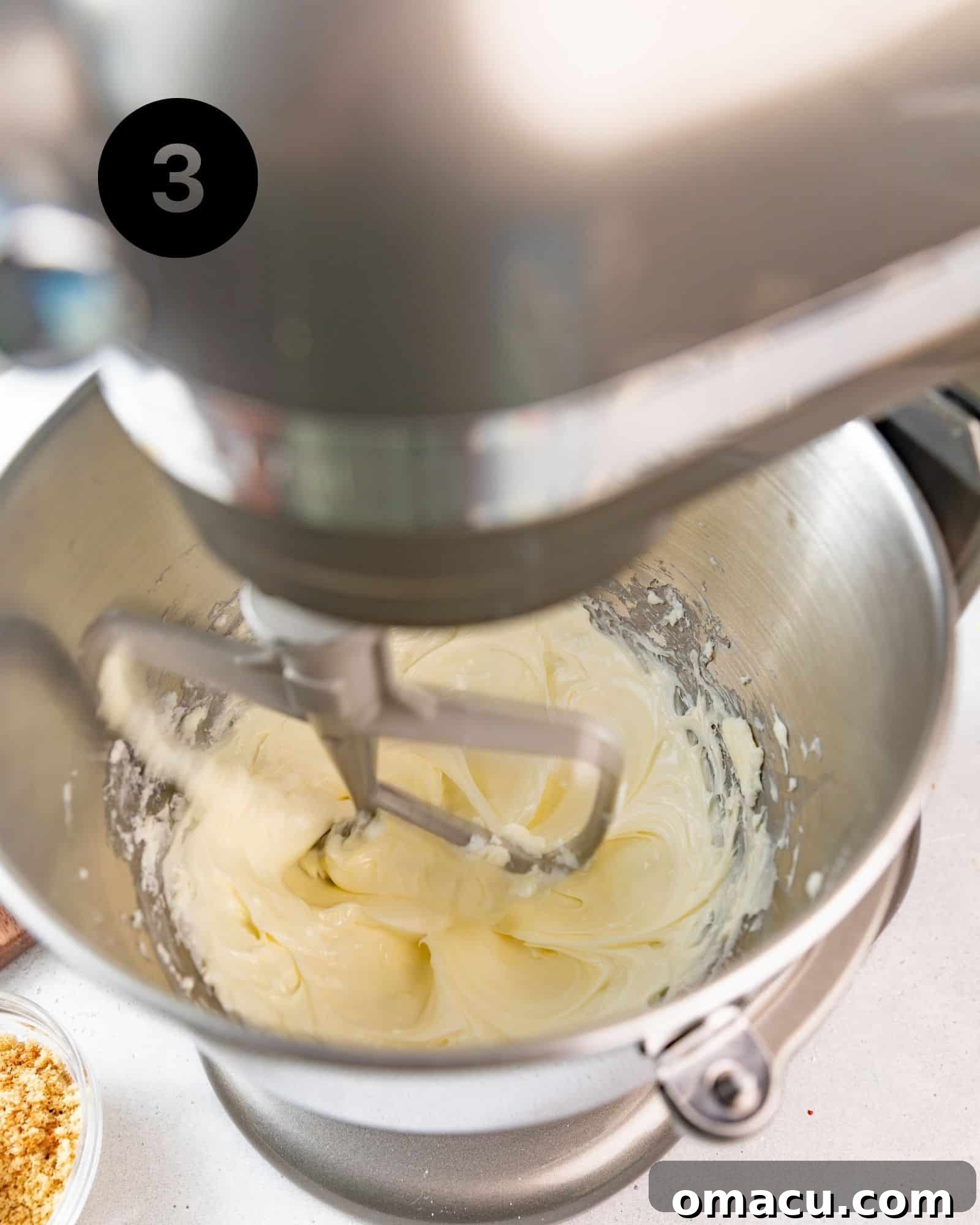 Close-up of butter and shortening expertly creamed together in a stand mixer bowl, light and fluffy.