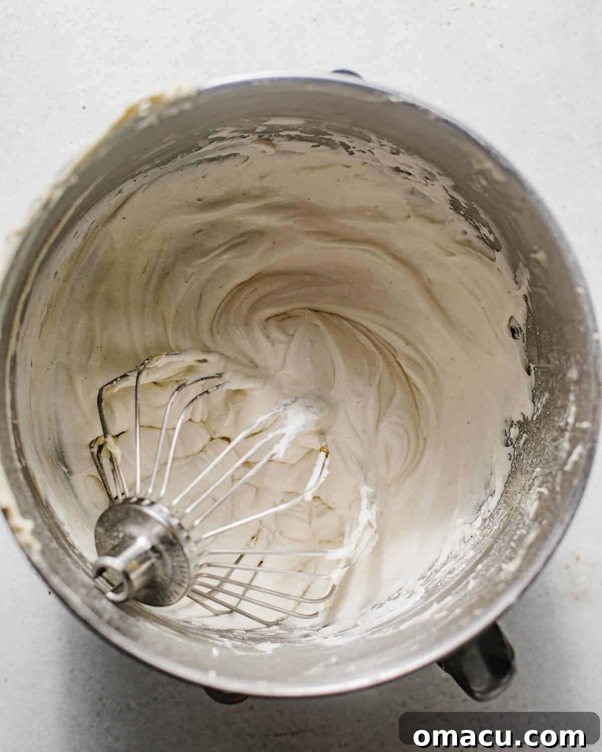 No churn ice cream whipped together in the bowl of a stand mixer.