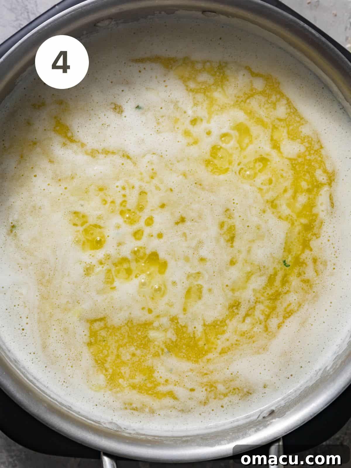 Melted butter and diced onions cooking in a skillet, filling the kitchen with aroma.
