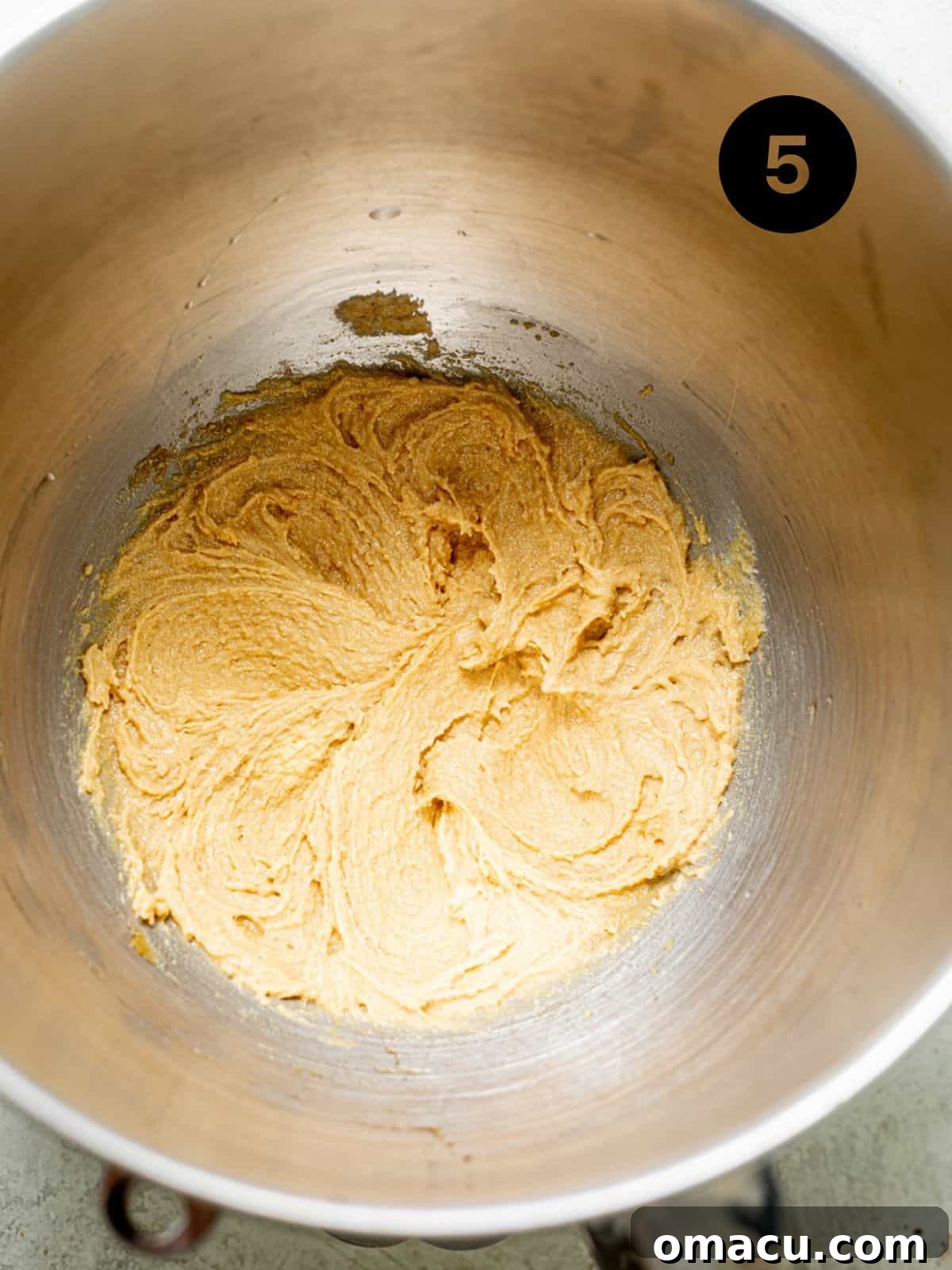 browned butter and sugar creamed together in a bowl. 