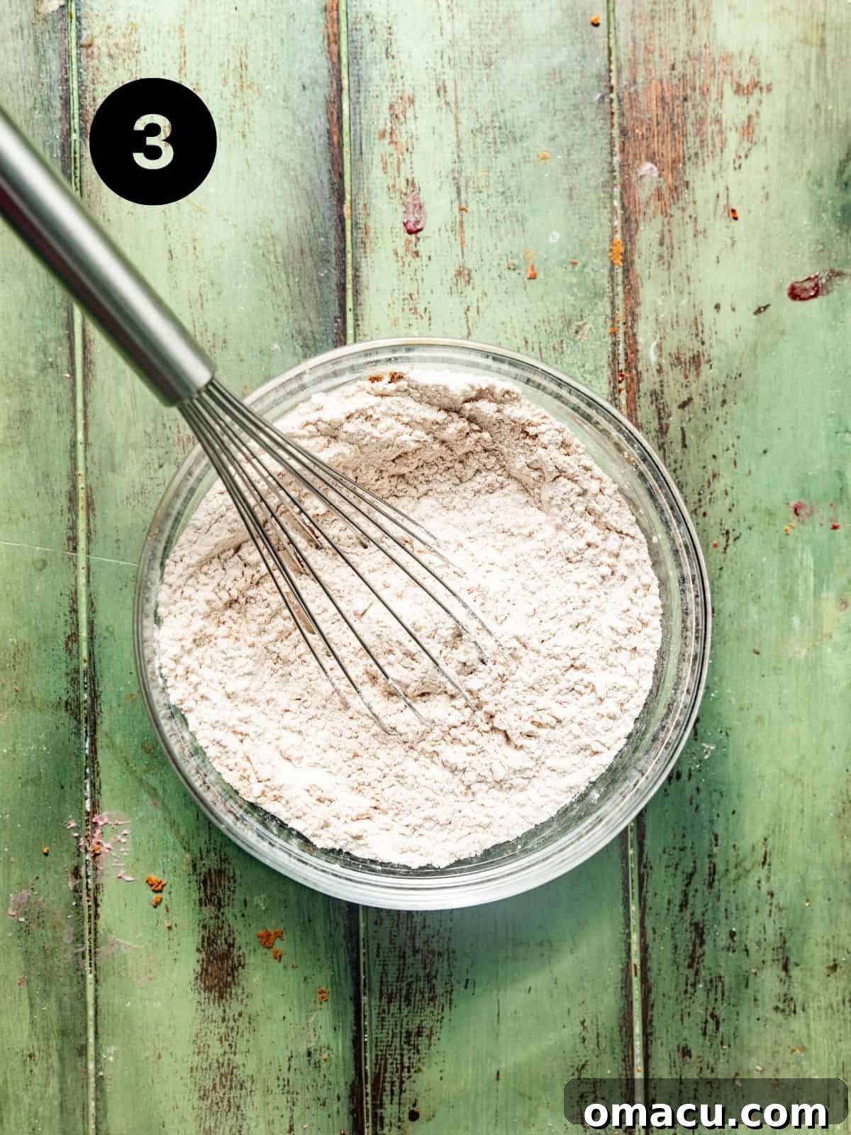 Dry ingredients, including flour, baking soda, cornstarch, cinnamon, nutmeg, and salt, perfectly whisked together in a separate bowl.
