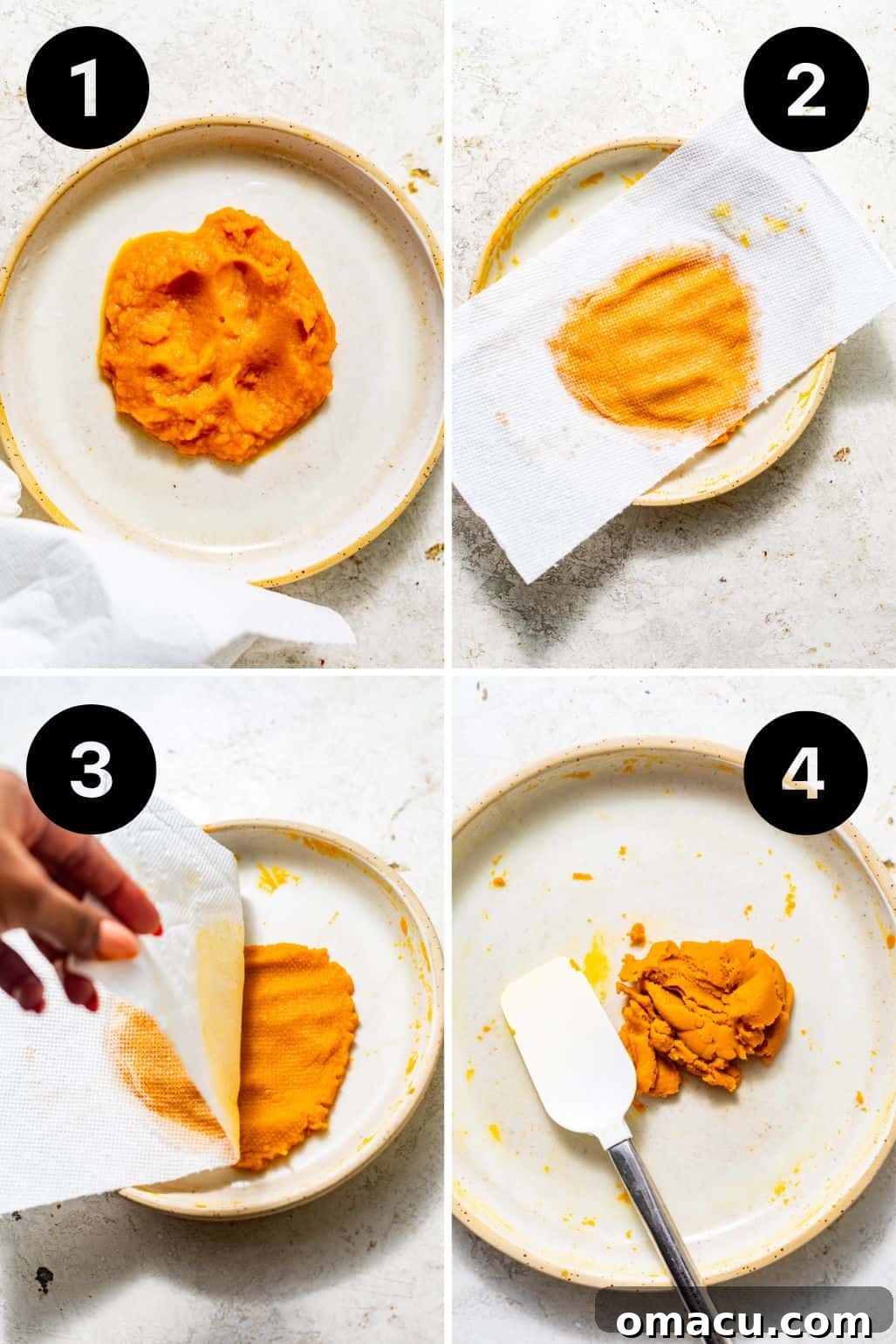 Pumpkin puree spread thinly on a plate with a paper towel on top, illustrating the process of blotting off excess moisture.