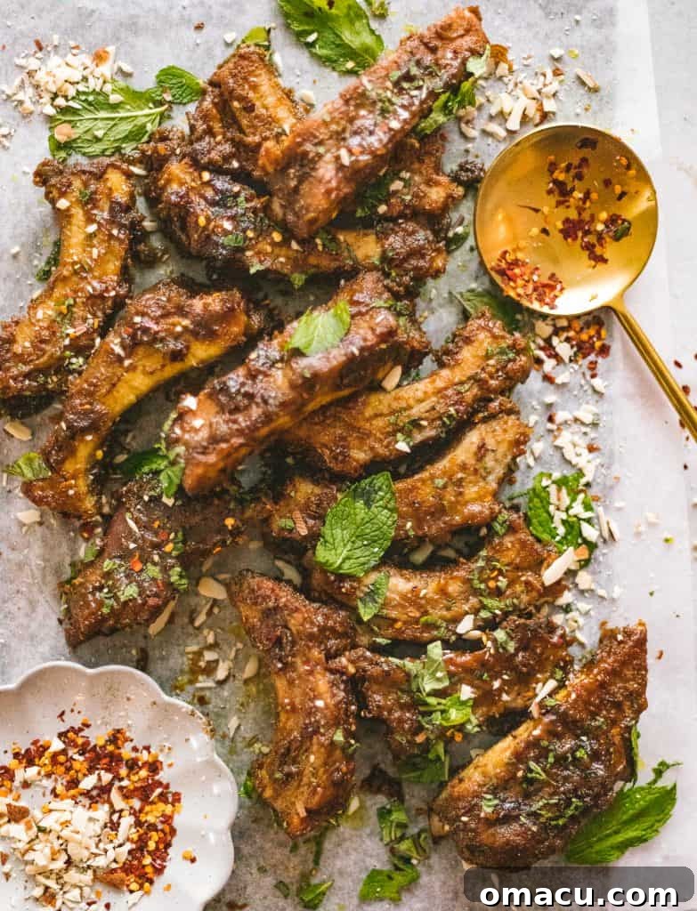 Delicious Peanut Curry Braised Ribs with fresh cilantro garnish