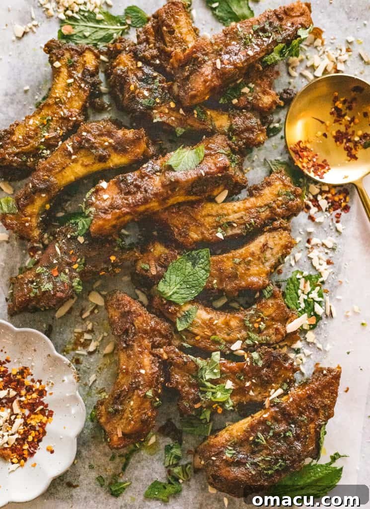 Table setting with a bowl of Peanut Curry Braised Ribs