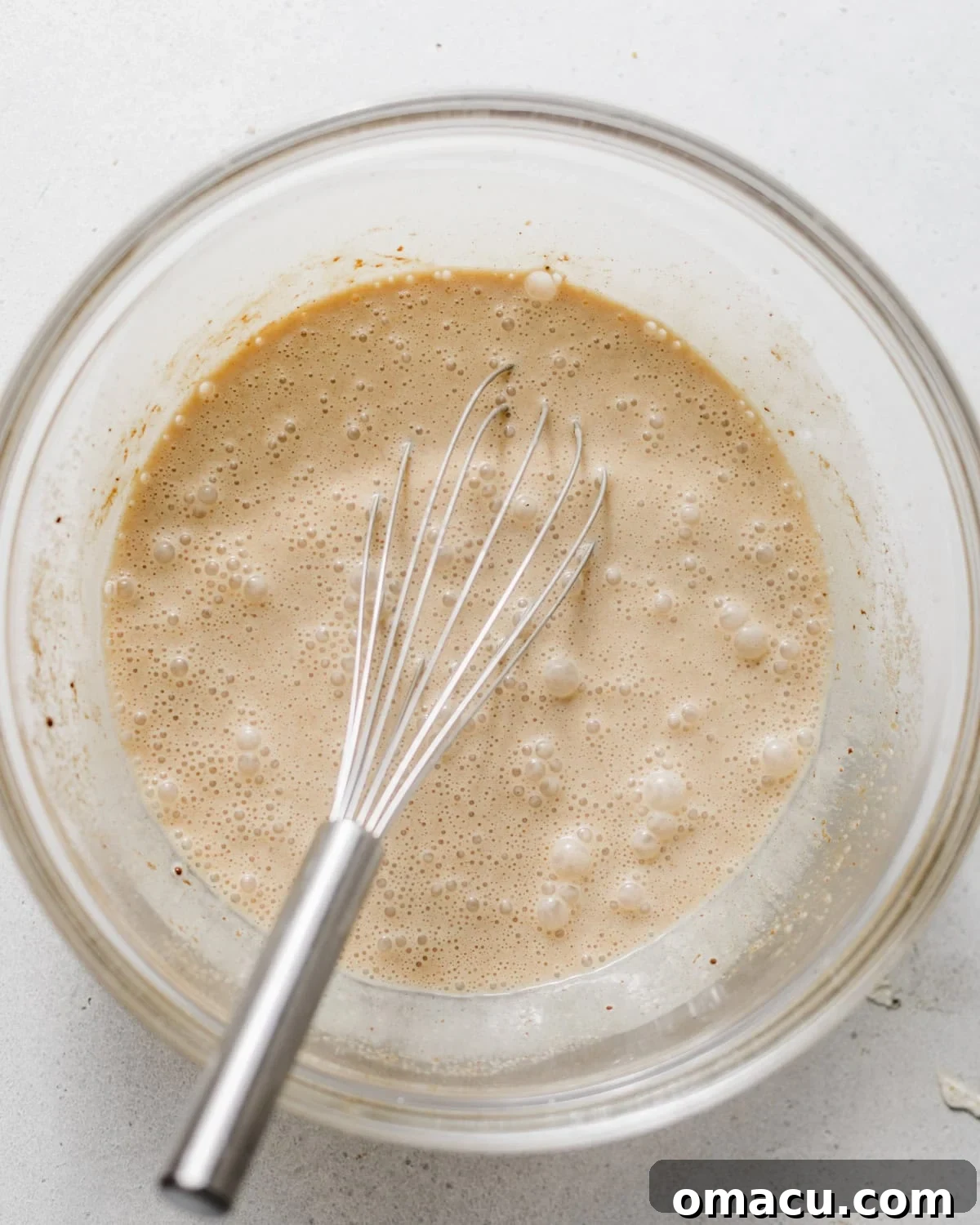 french toast custard mixed together in a bowl.