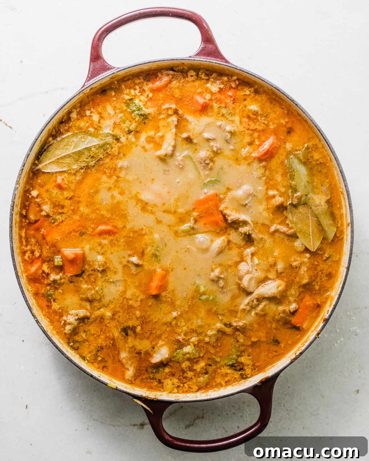 creamy chicken soup in a dutch oven.