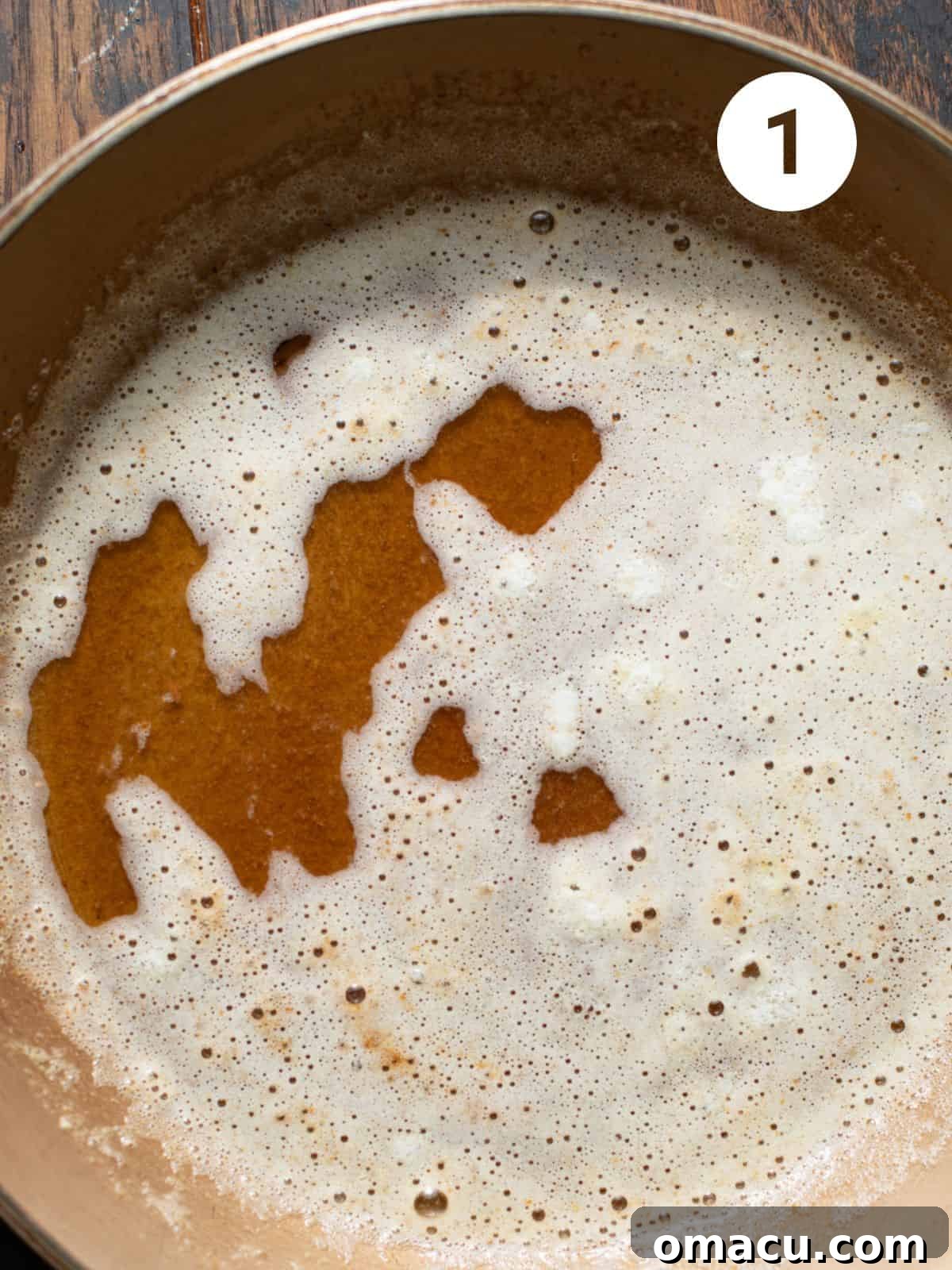 Golden brown butter simmering in a skillet, showcasing its nutty transformation.