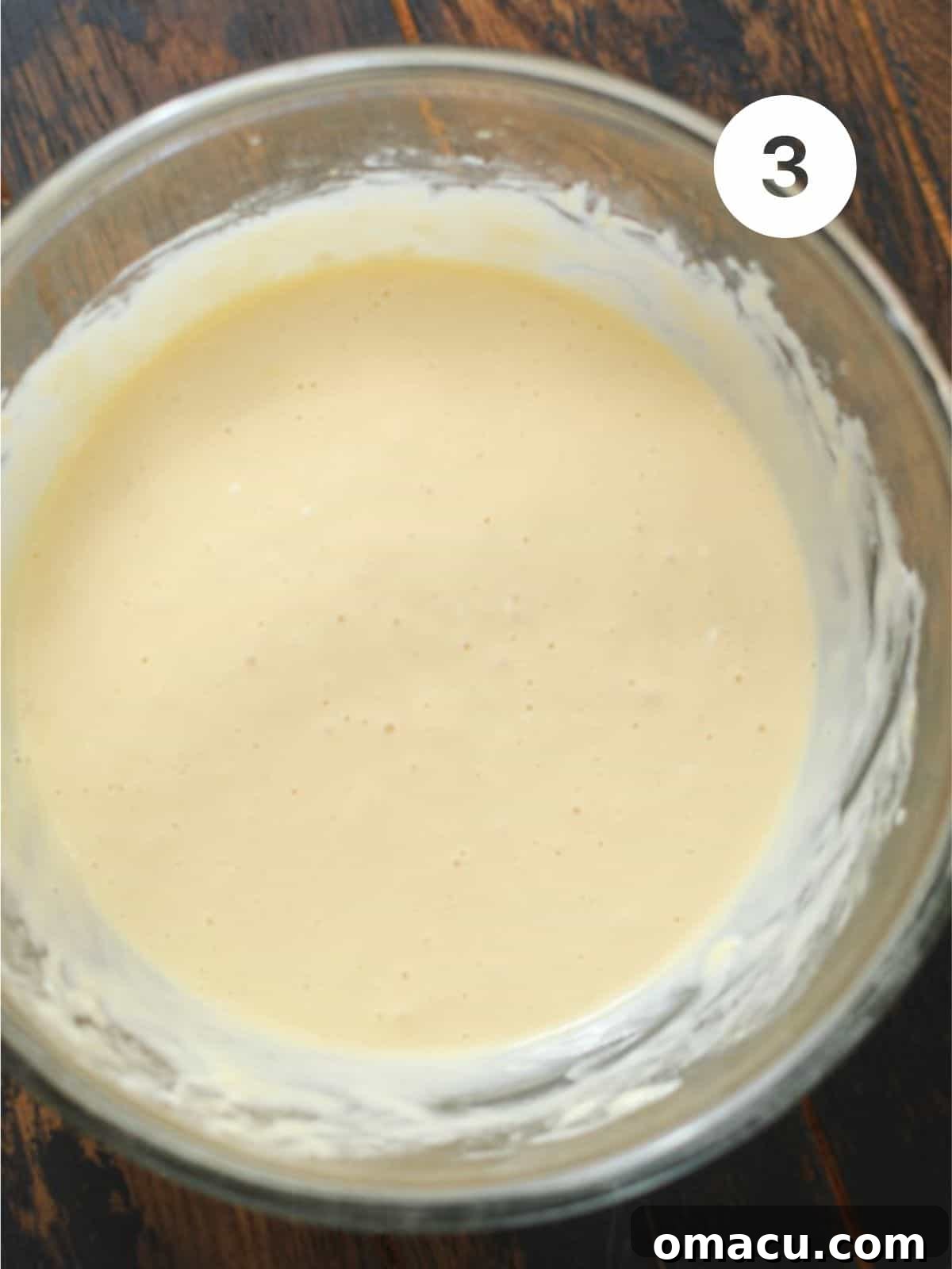 Wet ingredients (eggs, maple syrup, vanilla, sour cream) whisked smooth in a separate bowl.
