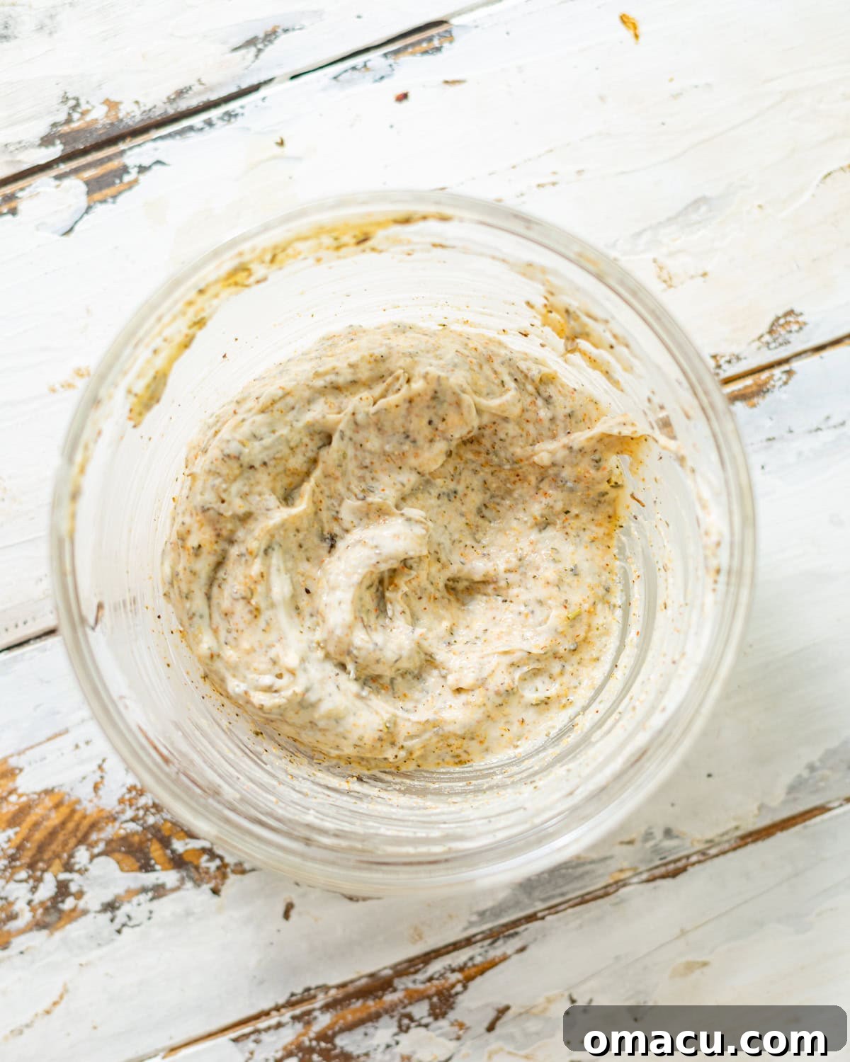spices and mayo mixed together in a small bowl. 
