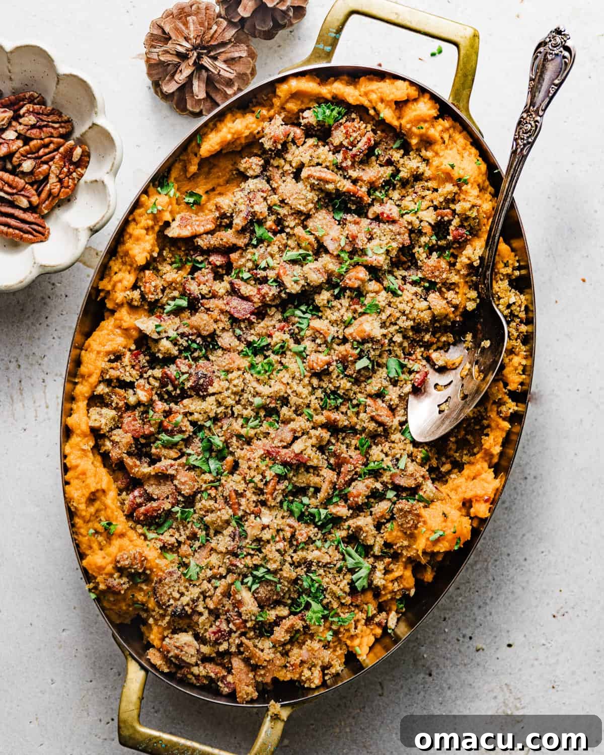 Overhead photo of savory sweet potato casserole, garnished and ready for serving.