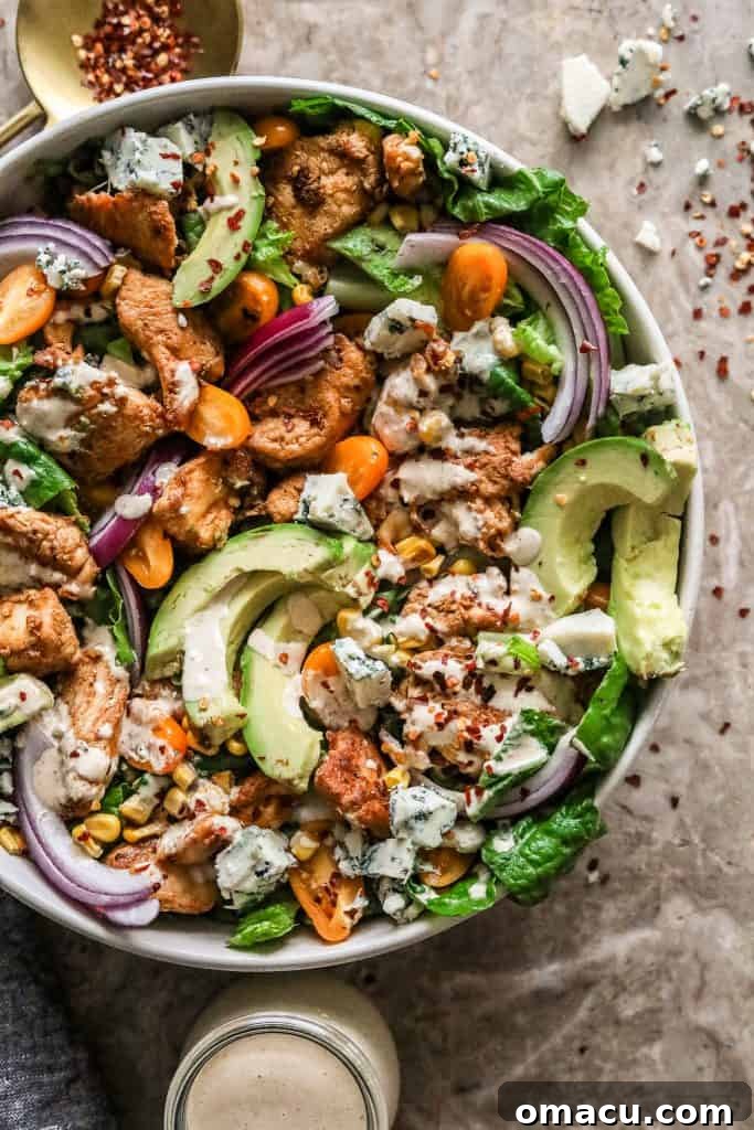 Overview of Cajun Chicken Caesar Salad ingredients laid out on a kitchen counter