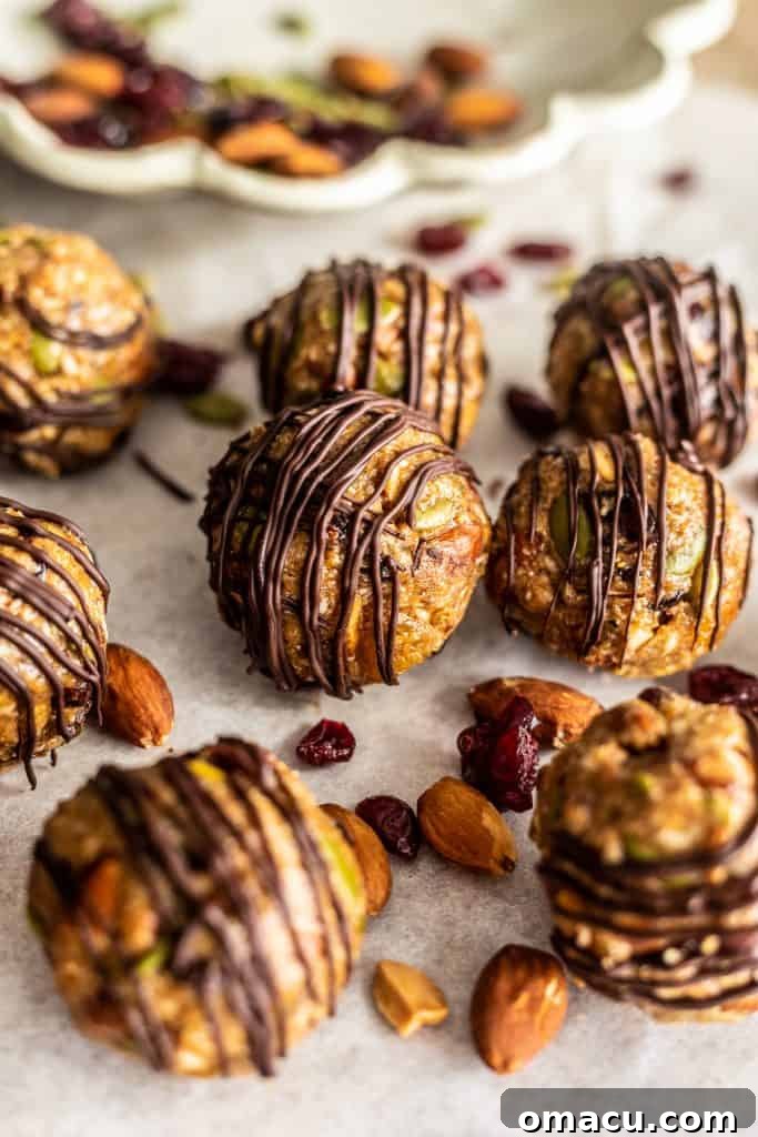 Delicious and healthy energy bites arranged artfully on a wooden board, showcasing their vibrant colors and wholesome texture.