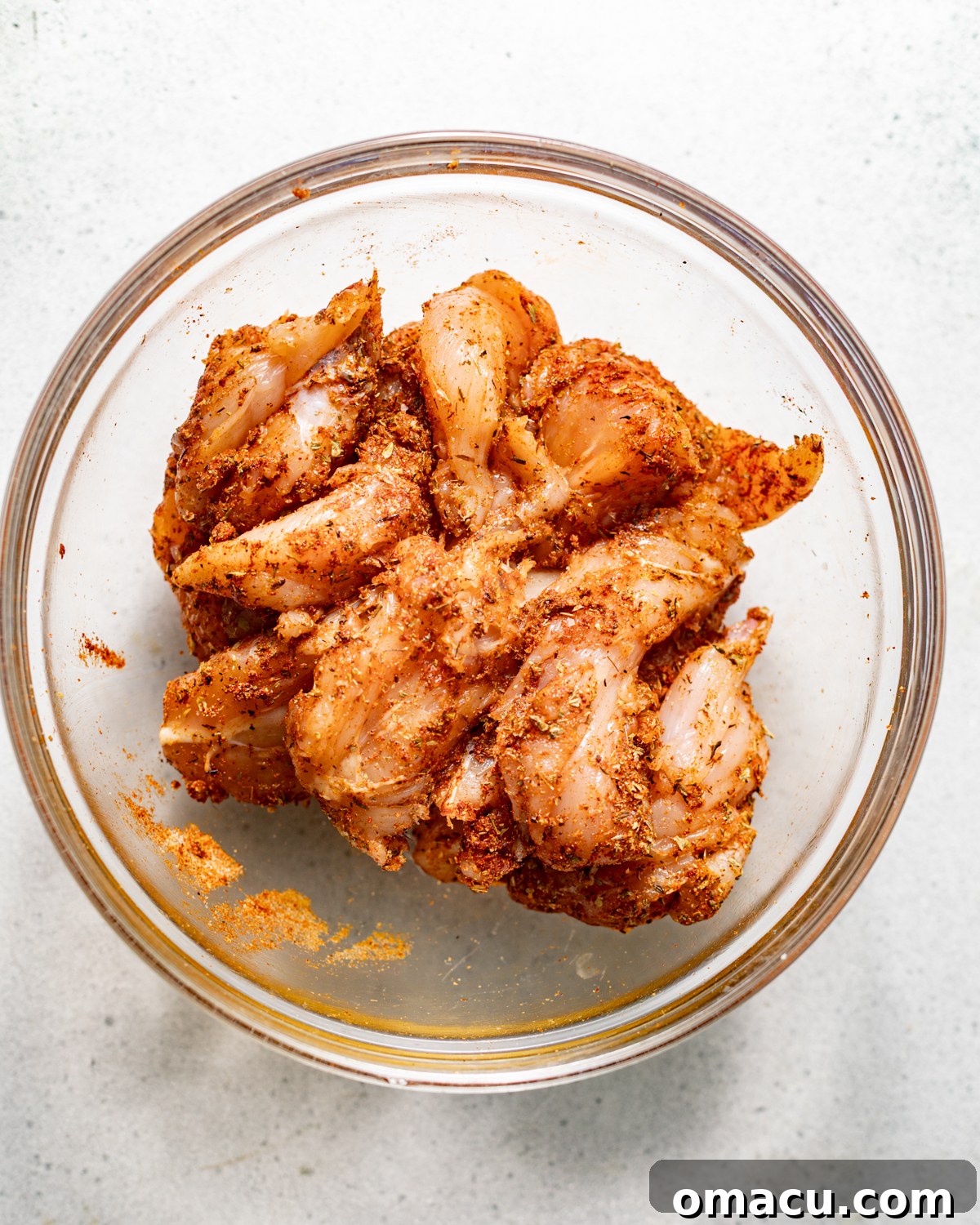 seasoned chicken in a bowl. 