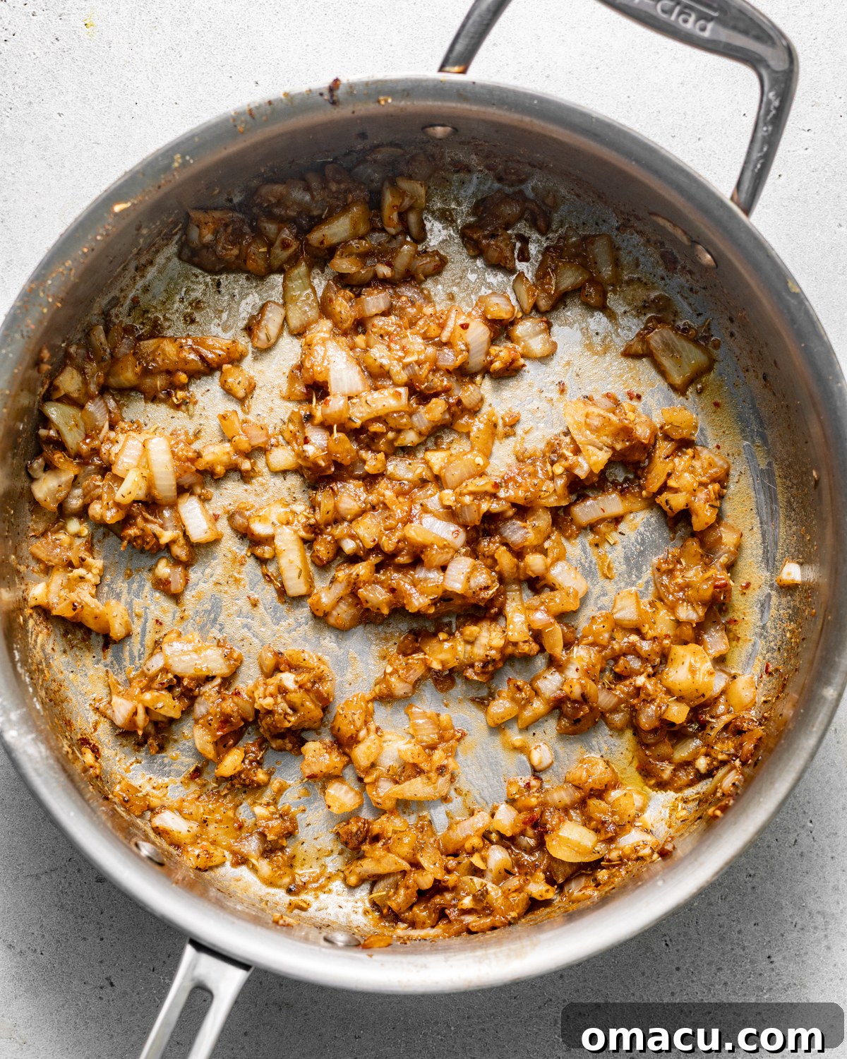 sauteed onion, garlic, seasonings, butter, and flour in a skillet.